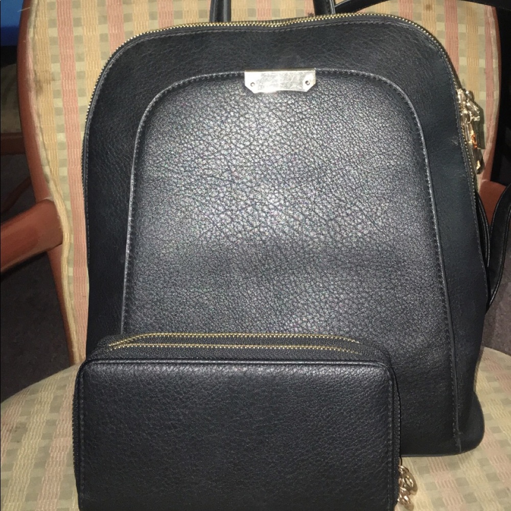 Great condition back pack purse with wallet